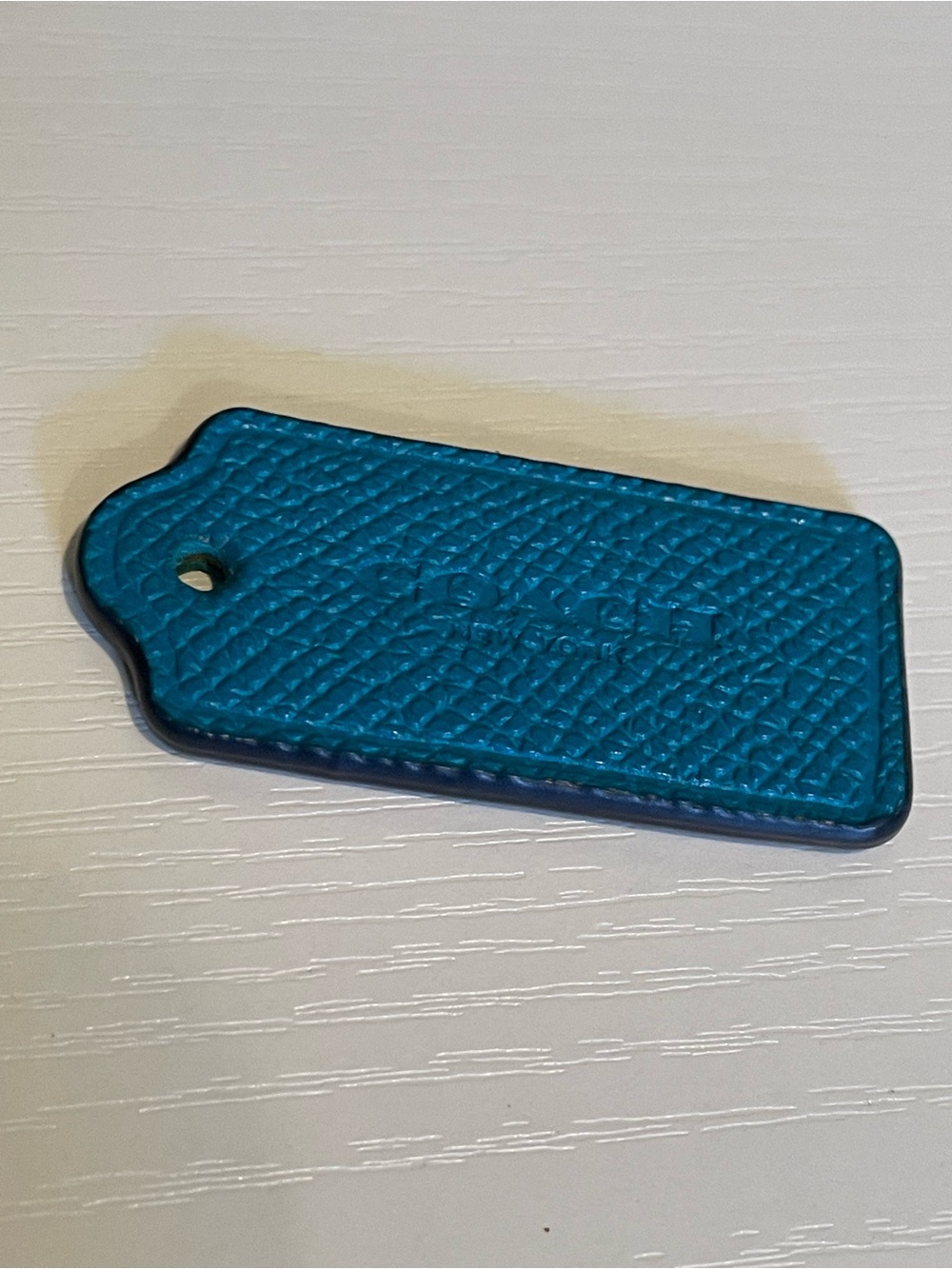Coach Teal Pebbled Leather Tag